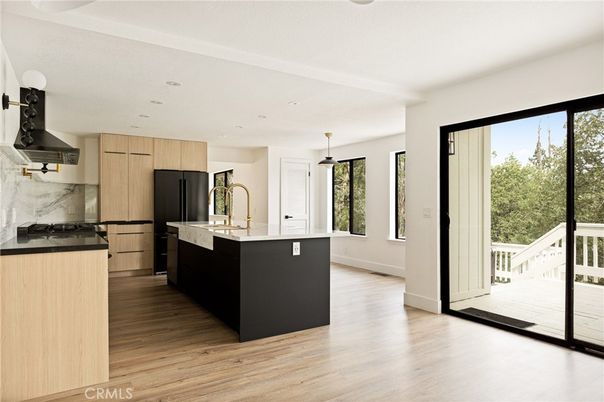 Interior, Kitchen, Marble Walls, Pendant Lights, Recessed Lighting, Wood Texture Flooring