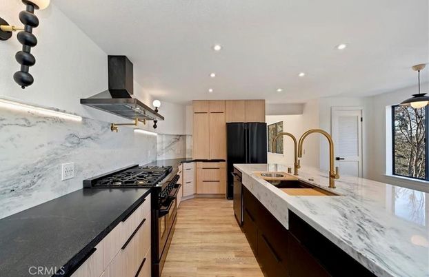 Interior, Kitchen, Marble Walls, Pendant Lights, Recessed Lighting, Stainless Steel Appliances, Wood Texture Flooring