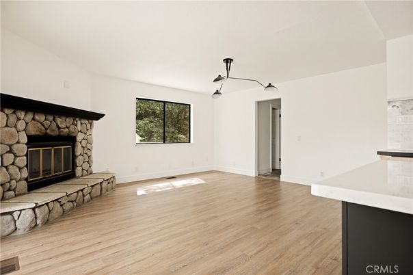 Empty room, Fireplace, Interior, Pendant Lights, Wood Texture Flooring