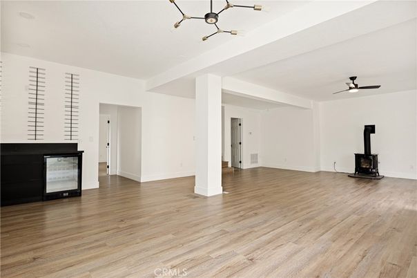 Empty room, Fireplace, Interior, Pendant Lights, Wood Texture Flooring