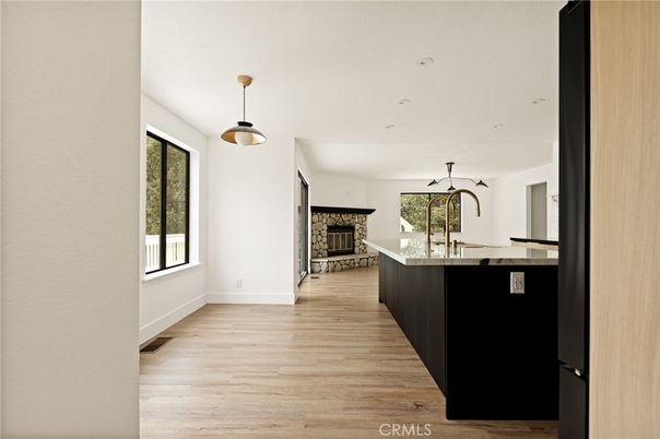 Fireplace, Interior, Kitchen, Pendant Lights, Recessed Lighting, Wood Texture Flooring