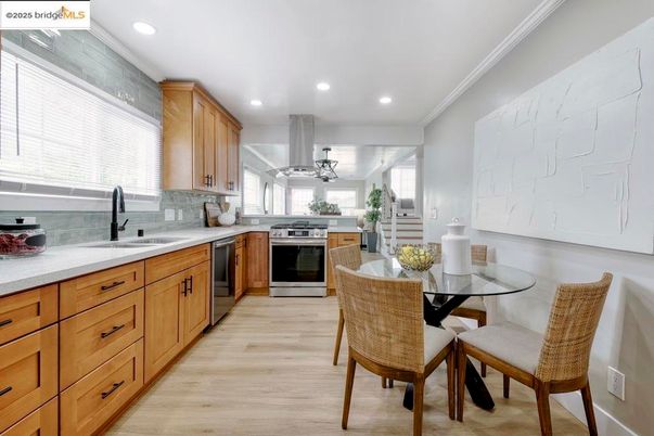 Dining room, Interior, Kitchen, Recessed Lighting, Stainless Steel Appliances, Wood Texture Flooring