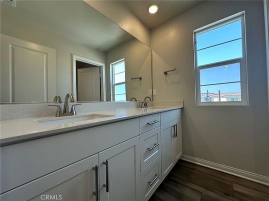 Bathroom, Dual Sink Vanities, Interior, Recessed Lighting, Wood Texture Flooring