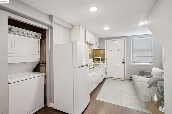 Interior, Kitchen, Recessed Lighting, Utility Closets, Washer, Wood Texture Flooring