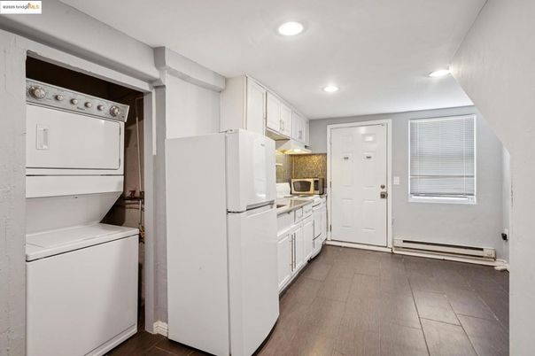 Interior, Kitchen, Recessed Lighting, Utility Closets, Washer, Wood Texture Flooring