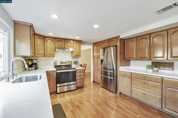 Interior, Kitchen, Recessed Lighting, Stainless Steel Appliances, Wood Texture Flooring