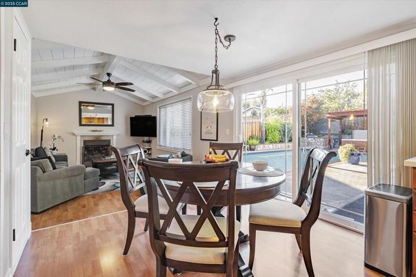 Dining room, Fireplace, Interior, Living room, Pendant Lights, Wood Texture Flooring
