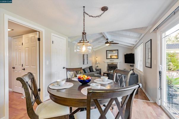 Dining room, Fireplace, Interior, Pendant Lights, Wood Texture Flooring