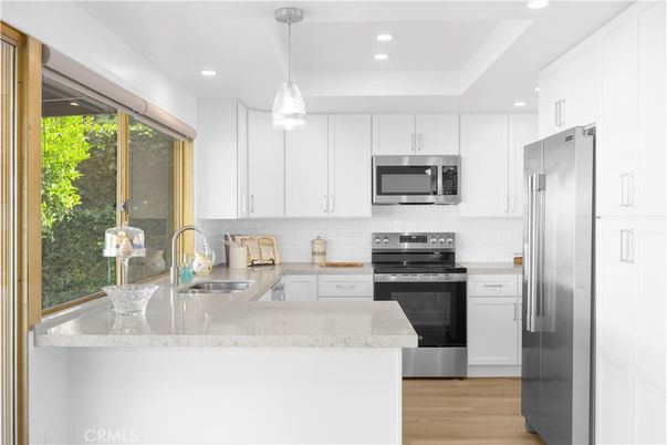 Interior, Kitchen, Pendant Lights, Recessed Lighting, Stainless Steel Appliances, Wood Texture Flooring