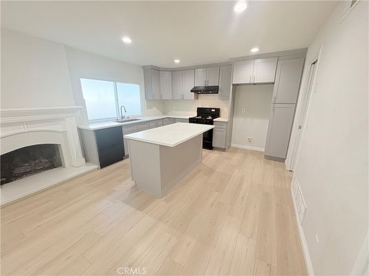Fireplace, Interior, Kitchen, Recessed Lighting, Wood Texture Flooring