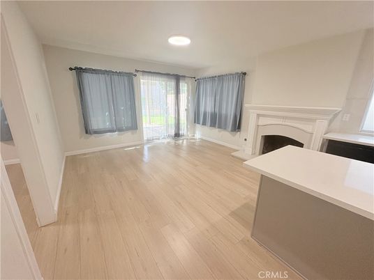 Empty room, Fireplace, Interior, Recessed Lighting, Wood Texture Flooring