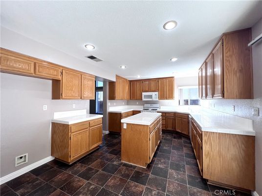 Interior, Kitchen, Recessed Lighting, Tile Countertops