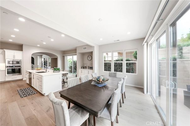 Dining room, Interior, Kitchen, Recessed Lighting, Stainless Steel Appliances, Wood Texture Flooring