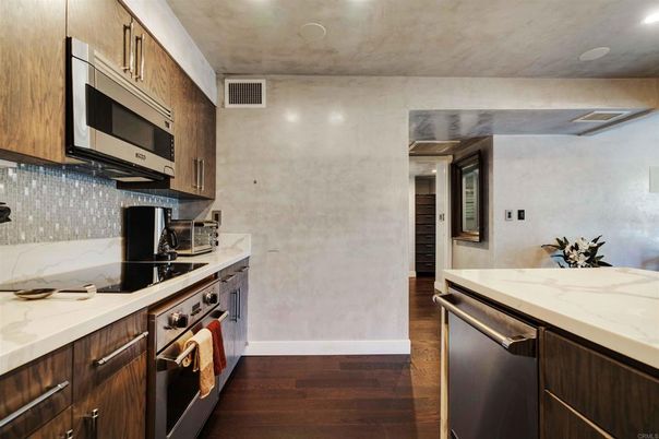 Interior, Kitchen, Recessed Lighting, Stainless Steel Appliances, Wood Texture Flooring