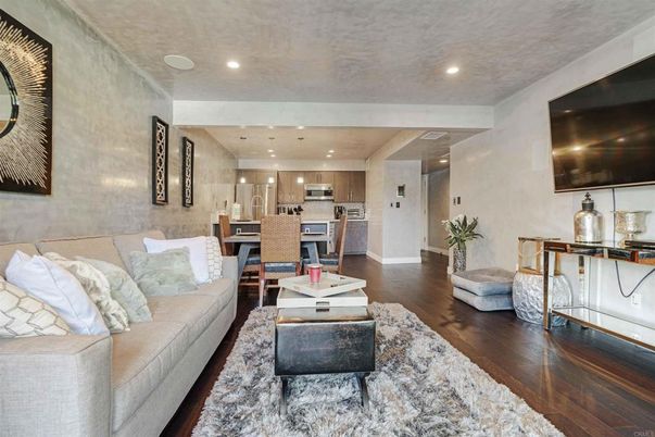Dining room, Interior, Kitchen, Living room, Recessed Lighting, Stainless Steel Appliances, Wood Texture Flooring