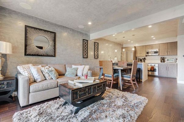 Dining room, Interior, Kitchen, Living room, Pendant Lights, Recessed Lighting, Stainless Steel Appliances, Wood Texture Flooring
