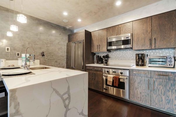 Interior, Kitchen, Pendant Lights, Recessed Lighting, Stainless Steel Appliances, Wood Texture Flooring