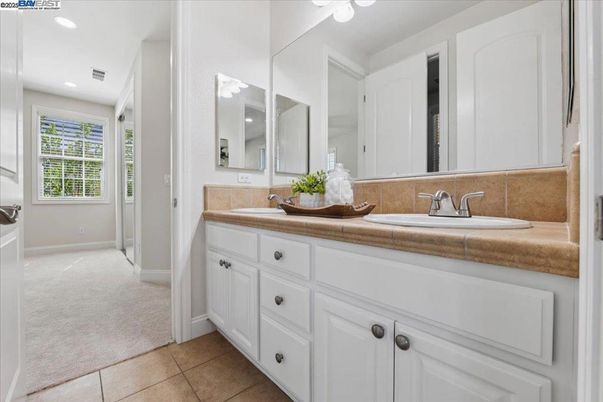 Bathroom, Dual Sink Vanities, Interior, Recessed Lighting, Tile Countertops