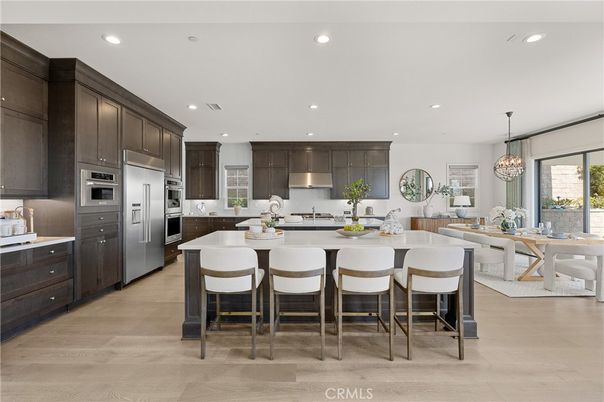 Chandelier, Dining room, Interior, Kitchen, Recessed Lighting, Stainless Steel Appliances, Wood Texture Flooring