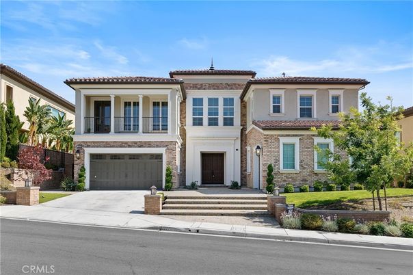 Attached, Exterior, Facade, Brick Facade, Mediterranean
