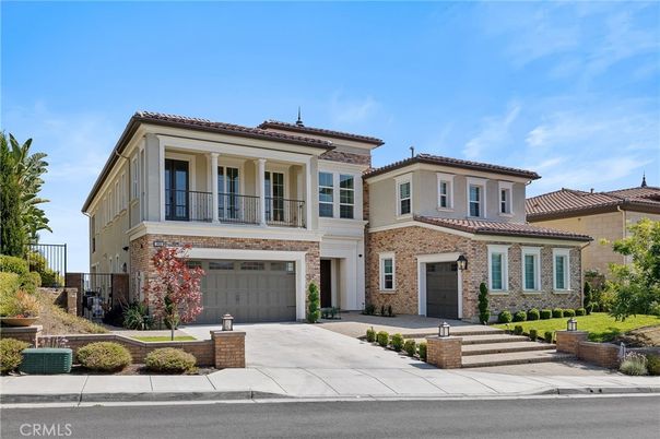 Attached, Exterior, Facade, Brick Facade, Mediterranean