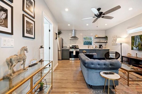 Interior, Kitchen, Living room, Recessed Lighting, Stainless Steel Appliances, Stone Walls, Wood Texture Flooring