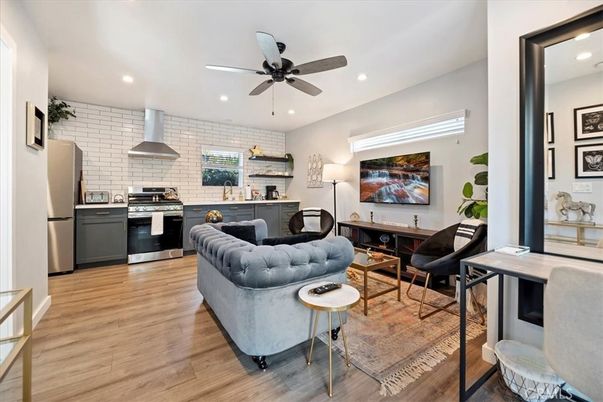 Interior, Kitchen, Living room, Recessed Lighting, Stainless Steel Appliances, Stone Walls, Wood Texture Flooring