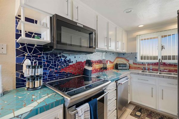 Interior, Kitchen, Recessed Lighting, Stainless Steel Appliances, Tile Countertops