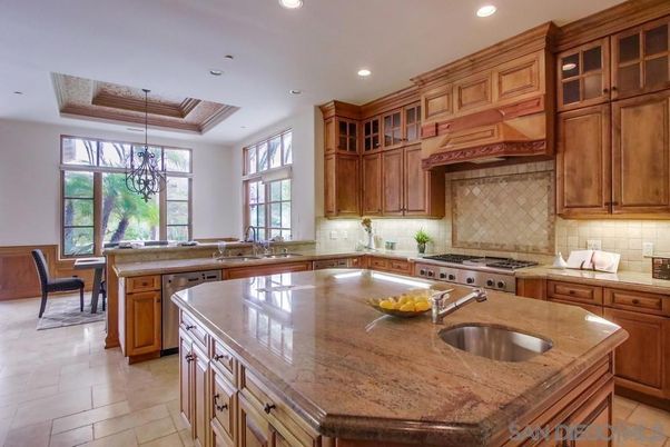 Chandelier, Dining room, Interior, Kitchen, Pendant Lights, Recessed Lighting, Stainless Steel Appliances, Wooden Ceilings