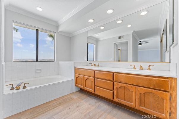 Bathroom, Dual Sink Vanities, Interior, Recessed Lighting, Wood Texture Flooring