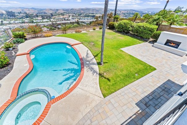 Exterior, Fireplace, Pool