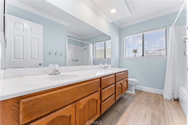 Bathroom, Dual Sink Vanities, Interior, Recessed Lighting, Wood Texture Flooring