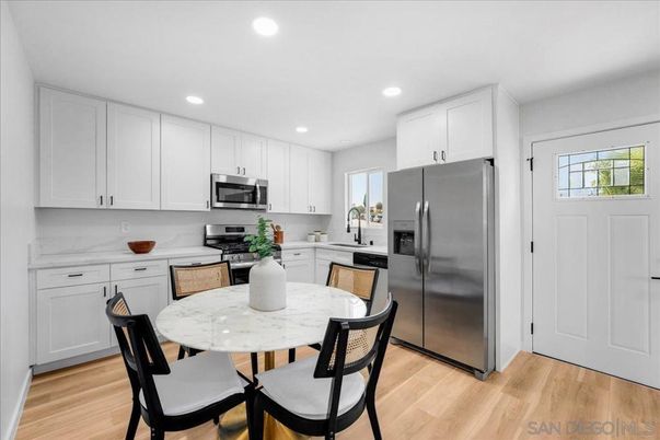 Dining room, Interior, Kitchen, Recessed Lighting, Stainless Steel Appliances, Wood Texture Flooring