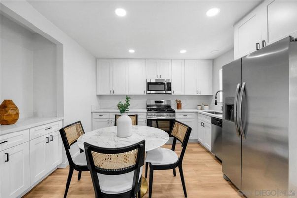 Dining room, Interior, Kitchen, Recessed Lighting, Stainless Steel Appliances, Wood Texture Flooring