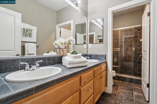 Bathroom, Dual Sink Vanities, Glass Shower, Interior, Tile Countertops