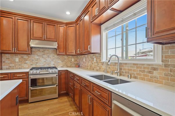 Interior, Kitchen, Recessed Lighting, Stainless Steel Appliances, Stone Walls, Wood Texture Flooring