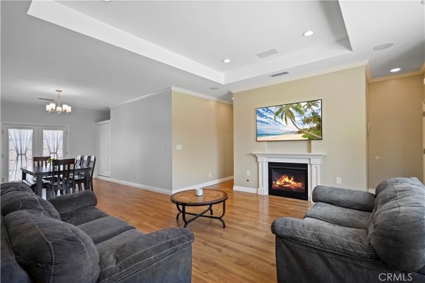 Chandelier, Dining room, Fireplace, Interior, Living room, Recessed Lighting, Wood Texture Flooring