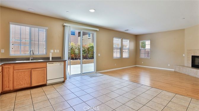 Empty room, Fireplace, Interior, Kitchen, Recessed Lighting, Wood Texture Flooring