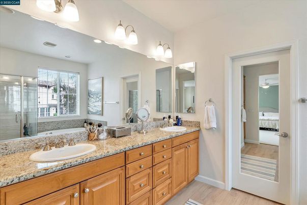 Bathroom, Bedroom, Dual Sink Vanities, Glass Shower, Interior, Wood Texture Flooring