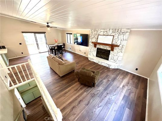 Dining room, Fireplace, Interior, Living room, Stone Walls, Wood Texture Flooring