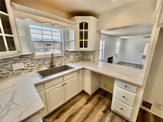 Interior, Kitchen, Marble Walls, Recessed Lighting, Wood Texture Flooring
