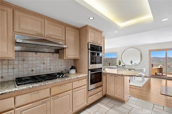 Dining room, Interior, Kitchen, Recessed Lighting, Stainless Steel Appliances, Wood Texture Flooring