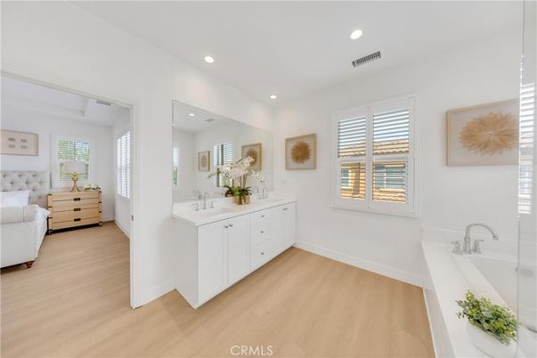 Bathroom, Dual Sink Vanities, Interior, Recessed Lighting, Wood Texture Flooring