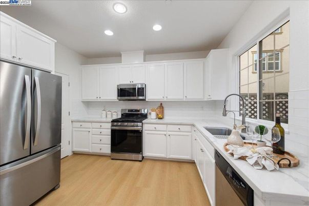 Interior, Kitchen, Recessed Lighting, Stainless Steel Appliances, Wood Texture Flooring