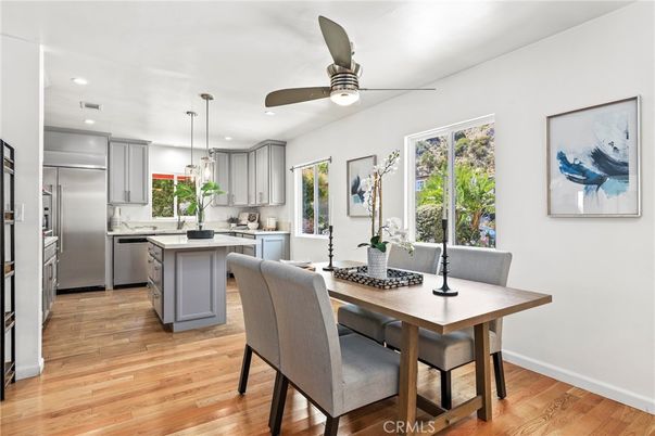 Dining room, Interior, Kitchen, Pendant Lights, Recessed Lighting, Stainless Steel Appliances, Wood Texture Flooring