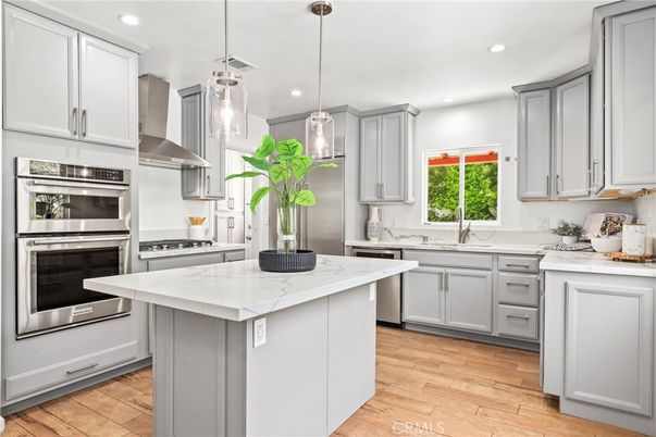 Interior, Kitchen, Pendant Lights, Recessed Lighting, Stainless Steel Appliances, Wood Texture Flooring