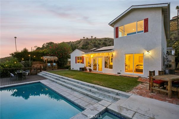 Exterior, Pool, Solar Panels
