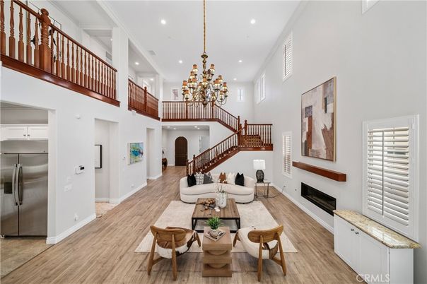 Chandelier, Fireplace, Interior, Living room, Recessed Lighting, Wood Texture Flooring