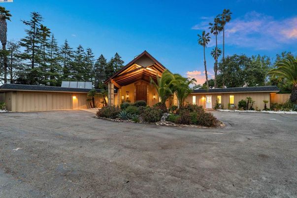 Attached, Backyard, Exterior, Facade, Solar Panels, Log Home