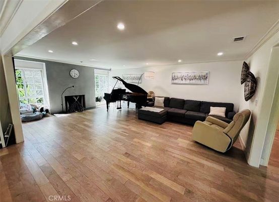 Fireplace, Interior, Living room, Piano, Recessed Lighting, Wood Texture Flooring